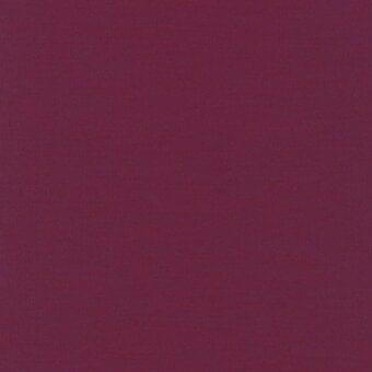 Burgundy fabric swatch with uniform melange texture, tightly woven matte finish, and “lacividina” product label visible along the bottom edge.